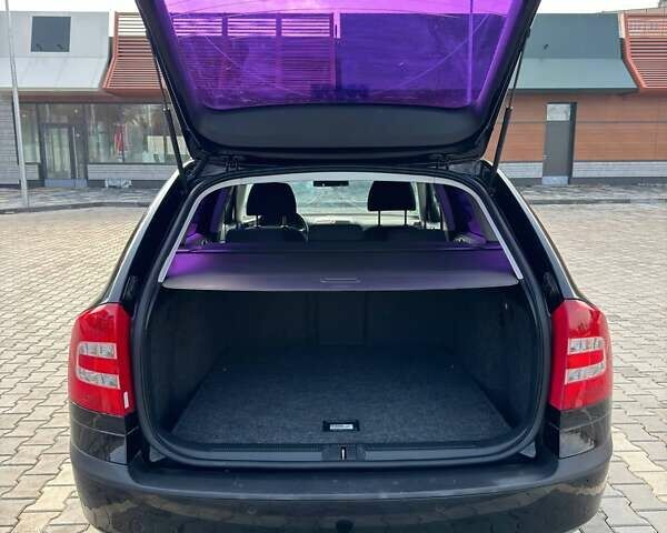 Черный Шкода Октавия, объемом двигателя 1.6 л и пробегом 212 тыс. км за 6999 $, фото 13 на Automoto.ua