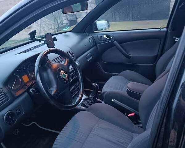 Черный Шкода Октавия, объемом двигателя 1.6 л и пробегом 193 тыс. км за 5700 $, фото 8 на Automoto.ua