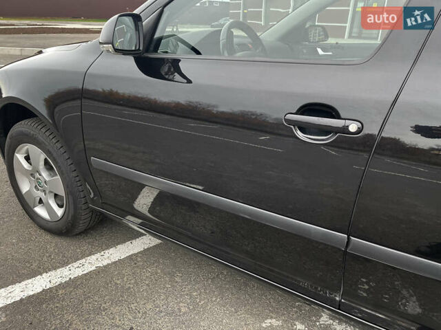 Чорний Шкода Октавія, об'ємом двигуна 1.8 л та пробігом 149 тис. км за 7399 $, фото 11 на Automoto.ua