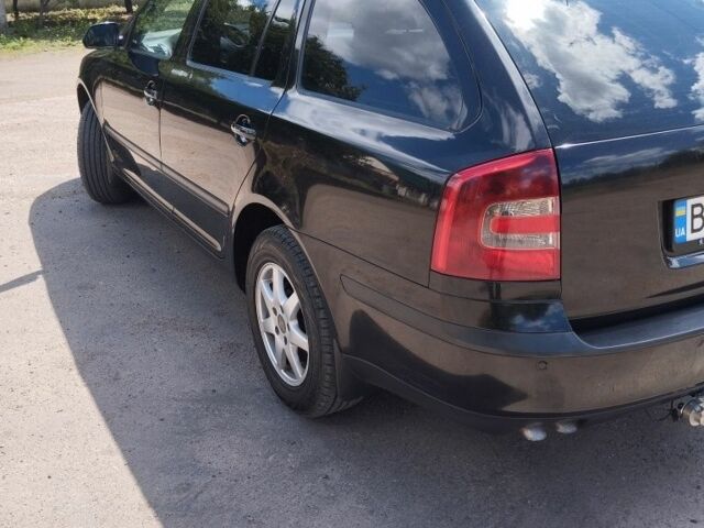 Чорний Шкода Октавія, об'ємом двигуна 2 л та пробігом 231 тис. км за 6700 $, фото 3 на Automoto.ua