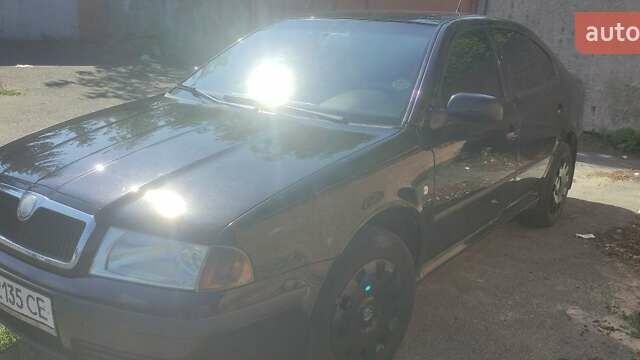 Черный Шкода Октавия, объемом двигателя 1.6 л и пробегом 279 тыс. км за 4900 $, фото 1 на Automoto.ua