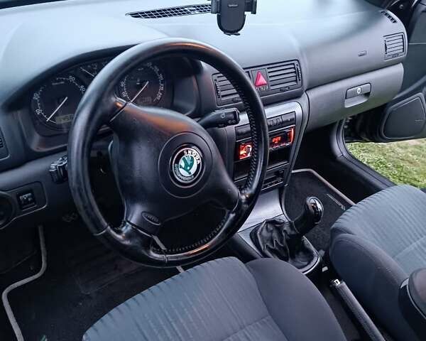 Черный Шкода Октавия, объемом двигателя 1.6 л и пробегом 193 тыс. км за 5700 $, фото 4 на Automoto.ua