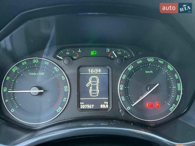 Черный Шкода Октавия, объемом двигателя 2 л и пробегом 307 тыс. км за 6990 $, фото 19 на Automoto.ua