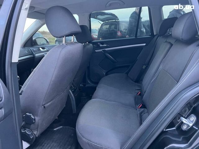 Чорний Шкода Октавія, об'ємом двигуна 2 л та пробігом 307 тис. км за 6990 $, фото 33 на Automoto.ua