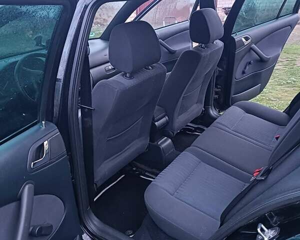 Черный Шкода Октавия, объемом двигателя 1.6 л и пробегом 193 тыс. км за 5700 $, фото 5 на Automoto.ua