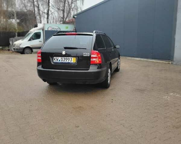 Черный Шкода Октавия, объемом двигателя 1.6 л и пробегом 217 тыс. км за 5900 $, фото 6 на Automoto.ua