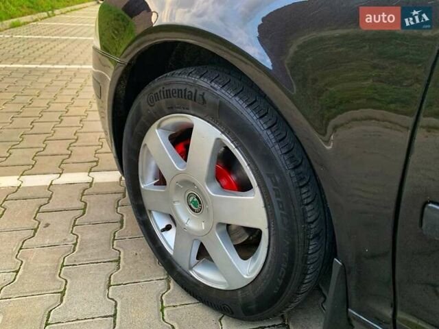 Черный Шкода Октавия, объемом двигателя 2 л и пробегом 306 тыс. км за 6499 $, фото 12 на Automoto.ua