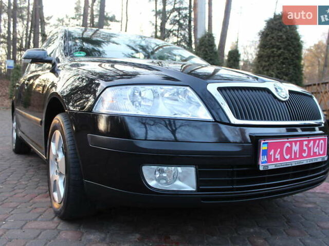 Черный Шкода Октавия, объемом двигателя 1.6 л и пробегом 215 тыс. км за 6390 $, фото 53 на Automoto.ua