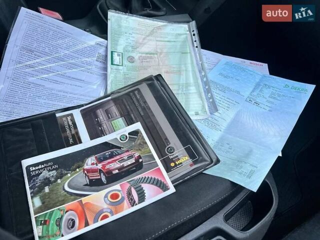 Чорний Шкода Октавія, об'ємом двигуна 1.8 л та пробігом 182 тис. км за 5999 $, фото 155 на Automoto.ua