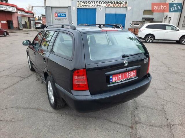 Шкода Октавия 2009 в Полтаве на Automoto.ua Черный Шкода Октавия, объемом двигателя 1.6 л и пробегом 219 тыс. км за 6700 $, фото 10 на Automoto.ua