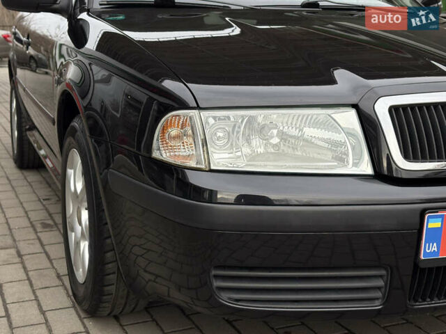 Черный Шкода Октавия, объемом двигателя 1.6 л и пробегом 218 тыс. км за 6777 $, фото 25 на Automoto.ua