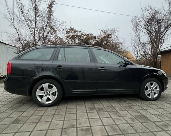 Черный Шкода Октавия, объемом двигателя 1.8 л и пробегом 320 тыс. км за 7500 $, фото 5 на Automoto.ua