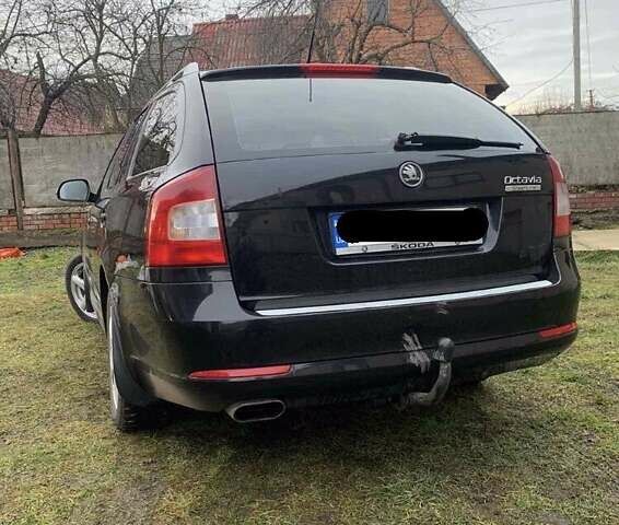Черный Шкода Октавия, объемом двигателя 1.6 л и пробегом 210 тыс. км за 8500 $, фото 2 на Automoto.ua