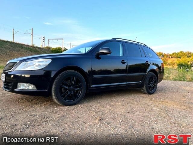 Черный Шкода Октавия, объемом двигателя 1.8 л и пробегом 200 тыс. км за 8400 $, фото 1 на Automoto.ua
