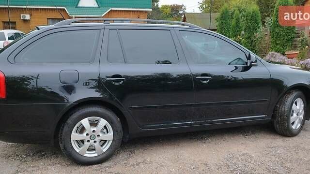 Чорний Шкода Октавія, об'ємом двигуна 1.6 л та пробігом 209 тис. км за 8299 $, фото 21 на Automoto.ua