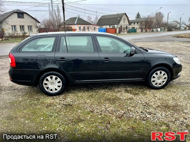 Черный Шкода Октавия, объемом двигателя 1.4 л и пробегом 165 тыс. км за 6999 $, фото 6 на Automoto.ua