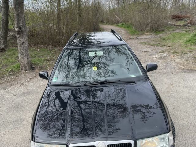 Черный Шкода Октавия, объемом двигателя 1.6 л и пробегом 201 тыс. км за 5650 $, фото 12 на Automoto.ua