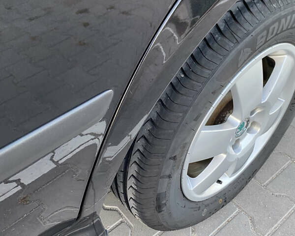 Чорний Шкода Октавія, об'ємом двигуна 1.6 л та пробігом 194 тис. км за 7400 $, фото 7 на Automoto.ua