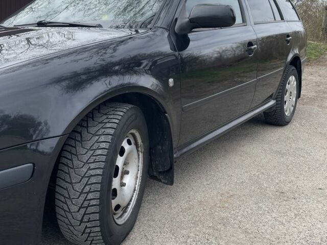 Черный Шкода Октавия, объемом двигателя 1.6 л и пробегом 201 тыс. км за 5650 $, фото 4 на Automoto.ua