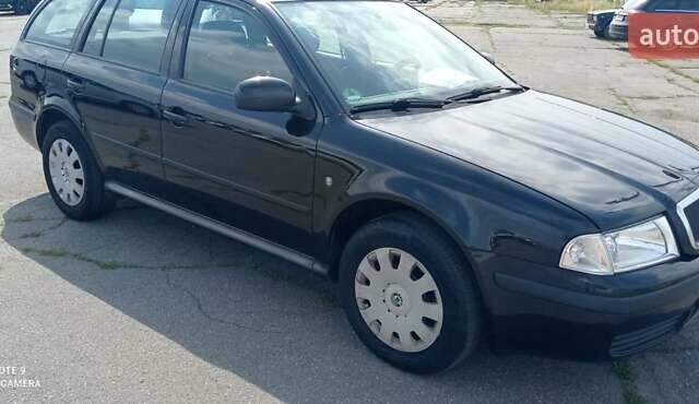 Черный Шкода Октавия, объемом двигателя 1.6 л и пробегом 273 тыс. км за 5600 $, фото 2 на Automoto.ua