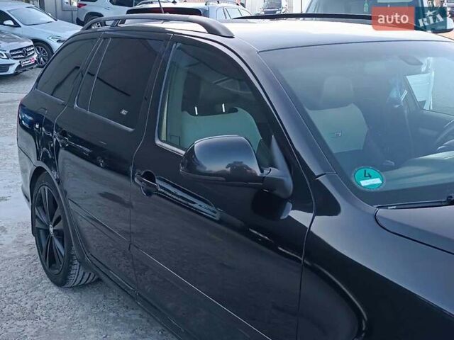 Чорний Шкода Октавія, об'ємом двигуна 2 л та пробігом 252 тис. км за 7990 $, фото 5 на Automoto.ua