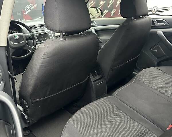 Чорний Шкода Октавія, об'ємом двигуна 1.8 л та пробігом 229 тис. км за 7800 $, фото 13 на Automoto.ua