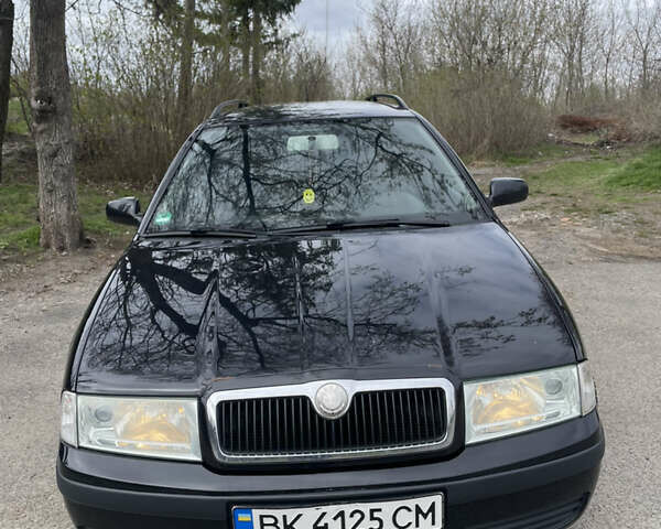 Чорний Шкода Октавія, об'ємом двигуна 1.6 л та пробігом 196 тис. км за 5800 $, фото 12 на Automoto.ua
