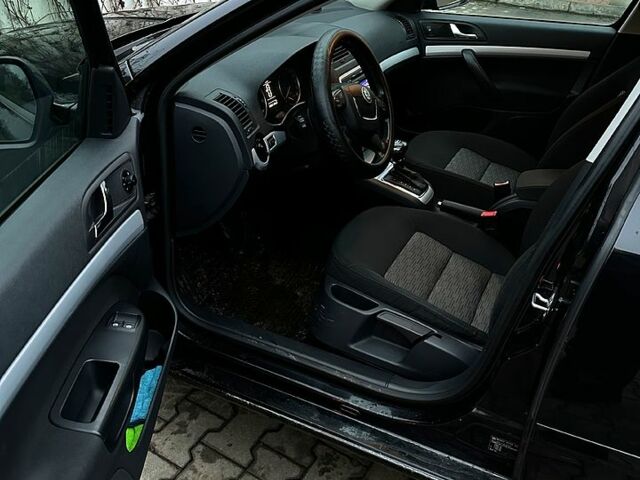 Черный Шкода Октавия, объемом двигателя 1.4 л и пробегом 169 тыс. км за 7500 $, фото 8 на Automoto.ua