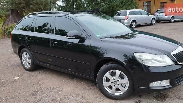 Чорний Шкода Октавія, об'ємом двигуна 1.6 л та пробігом 209 тис. км за 8299 $, фото 22 на Automoto.ua