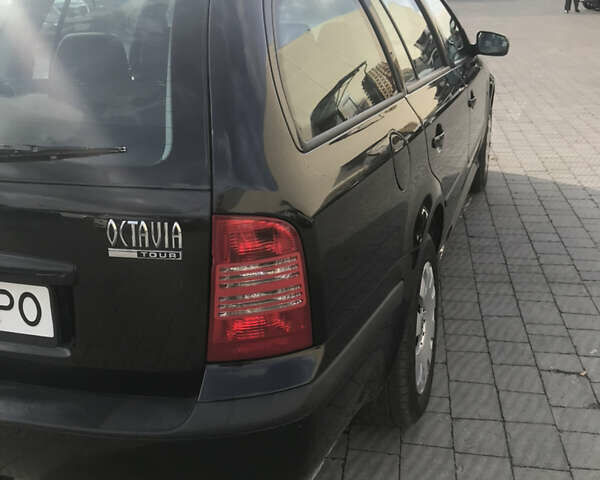 Черный Шкода Октавия, объемом двигателя 1.6 л и пробегом 217 тыс. км за 5700 $, фото 4 на Automoto.ua