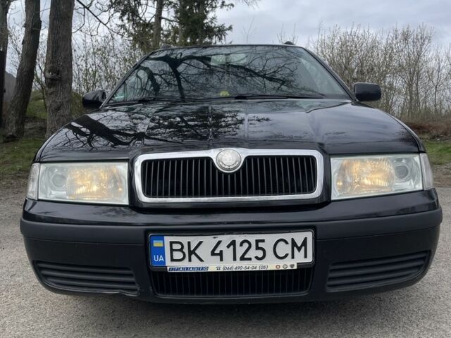 Черный Шкода Октавия, объемом двигателя 1.6 л и пробегом 201 тыс. км за 5650 $, фото 11 на Automoto.ua