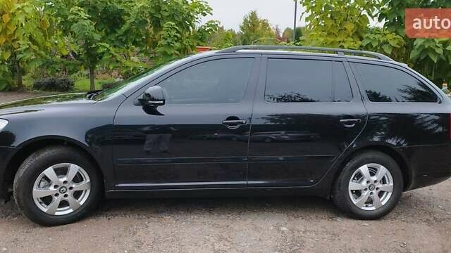 Чорний Шкода Октавія, об'ємом двигуна 1.6 л та пробігом 209 тис. км за 8299 $, фото 7 на Automoto.ua