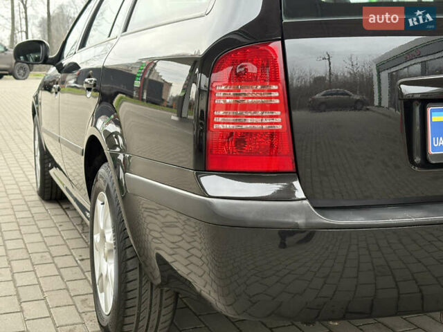 Черный Шкода Октавия, объемом двигателя 1.6 л и пробегом 218 тыс. км за 6777 $, фото 18 на Automoto.ua
