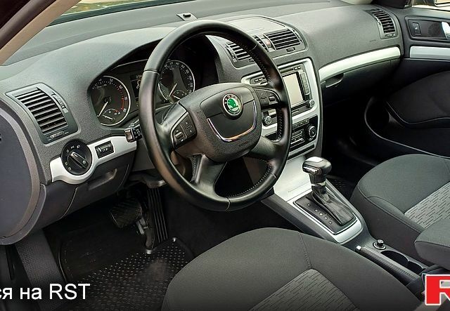 Черный Шкода Октавия, объемом двигателя 1.8 л и пробегом 176 тыс. км за 7800 $, фото 4 на Automoto.ua