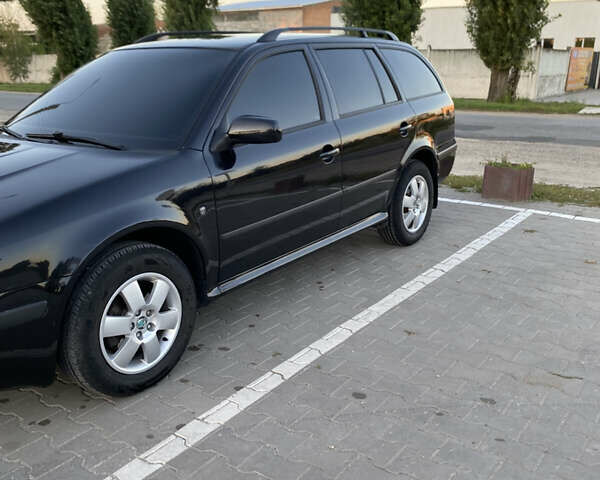 Чорний Шкода Октавія, об'ємом двигуна 1.6 л та пробігом 194 тис. км за 7400 $, фото 3 на Automoto.ua