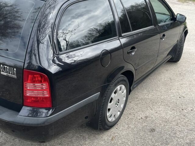 Черный Шкода Октавия, объемом двигателя 1.6 л и пробегом 201 тыс. км за 5650 $, фото 9 на Automoto.ua