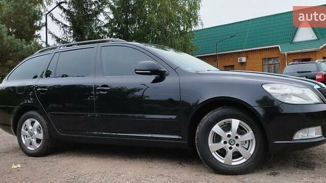 Чорний Шкода Октавія, об'ємом двигуна 1.6 л та пробігом 209 тис. км за 8299 $, фото 23 на Automoto.ua
