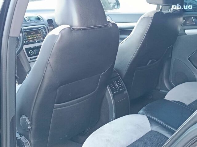 Черный Шкода Октавия, объемом двигателя 2 л и пробегом 252 тыс. км за 7990 $, фото 31 на Automoto.ua