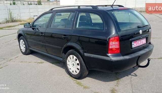 Черный Шкода Октавия, объемом двигателя 1.6 л и пробегом 273 тыс. км за 5600 $, фото 5 на Automoto.ua