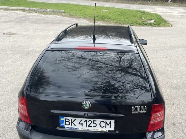 Черный Шкода Октавия, объемом двигателя 1.6 л и пробегом 201 тыс. км за 5650 $, фото 8 на Automoto.ua
