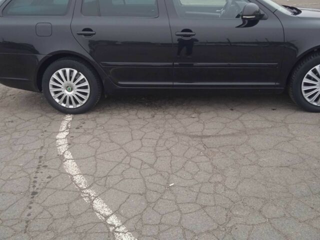 Черный Шкода Октавия, объемом двигателя 1.6 л и пробегом 193 тыс. км за 7400 $, фото 1 на Automoto.ua