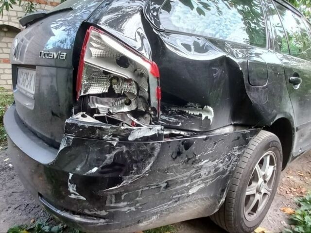 Черный Шкода Октавия, объемом двигателя 1.6 л и пробегом 310 тыс. км за 4250 $, фото 2 на Automoto.ua