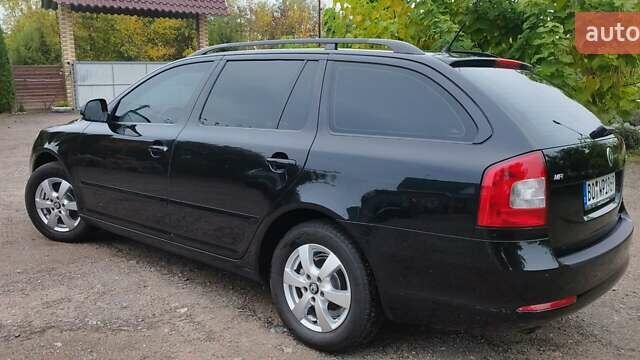 Чорний Шкода Октавія, об'ємом двигуна 1.6 л та пробігом 209 тис. км за 8299 $, фото 9 на Automoto.ua