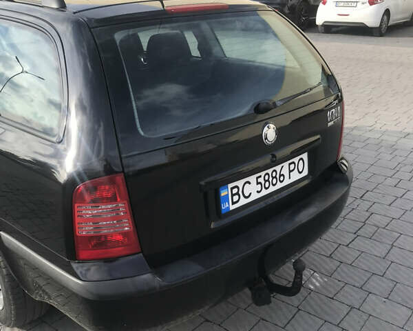 Черный Шкода Октавия, объемом двигателя 1.6 л и пробегом 217 тыс. км за 5700 $, фото 5 на Automoto.ua