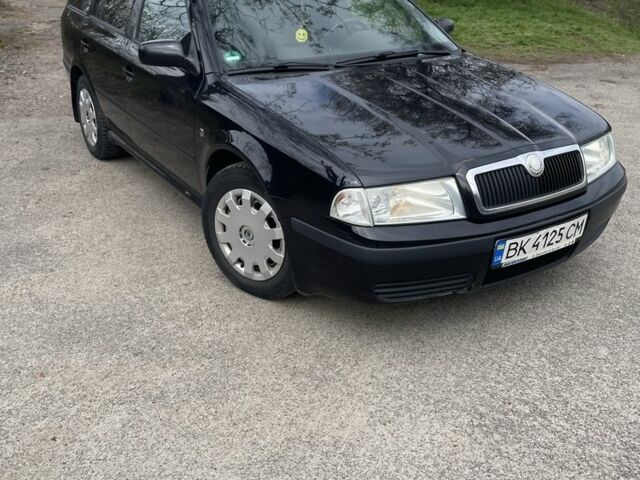 Черный Шкода Октавия, объемом двигателя 1.6 л и пробегом 201 тыс. км за 5650 $, фото 13 на Automoto.ua