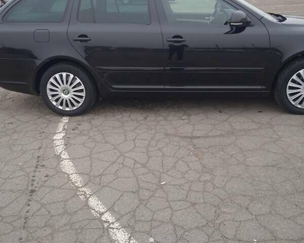 Чорний Шкода Октавія, об'ємом двигуна 1.6 л та пробігом 193 тис. км за 7400 $, фото 8 на Automoto.ua