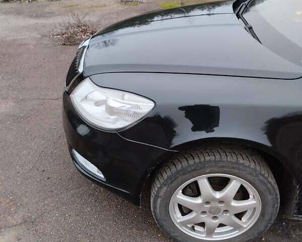 Черный Шкода Октавия, объемом двигателя 1.8 л и пробегом 212 тыс. км за 7700 $, фото 1 на Automoto.ua