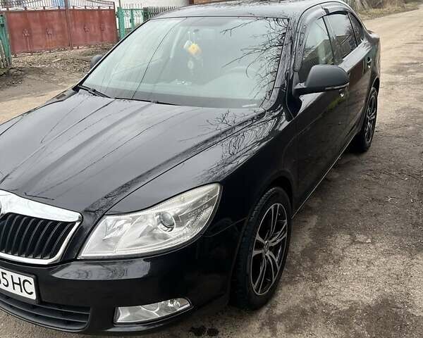 Чорний Шкода Октавія, об'ємом двигуна 1.4 л та пробігом 180 тис. км за 7600 $, фото 3 на Automoto.ua