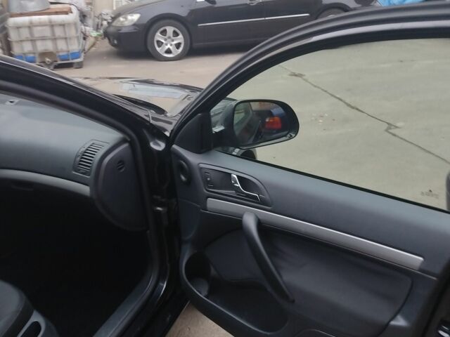 Чорний Шкода Октавія, об'ємом двигуна 1.4 л та пробігом 212 тис. км за 6999 $, фото 4 на Automoto.ua