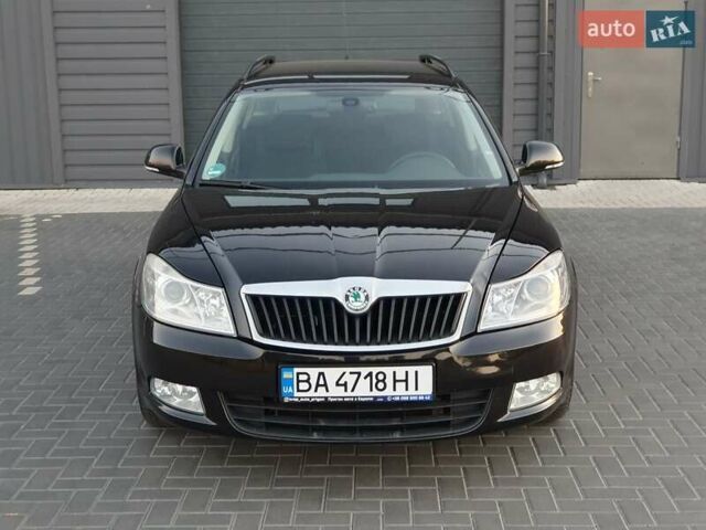 Черный Шкода Октавия, объемом двигателя 1.8 л и пробегом 245 тыс. км за 7350 $, фото 1 на Automoto.ua